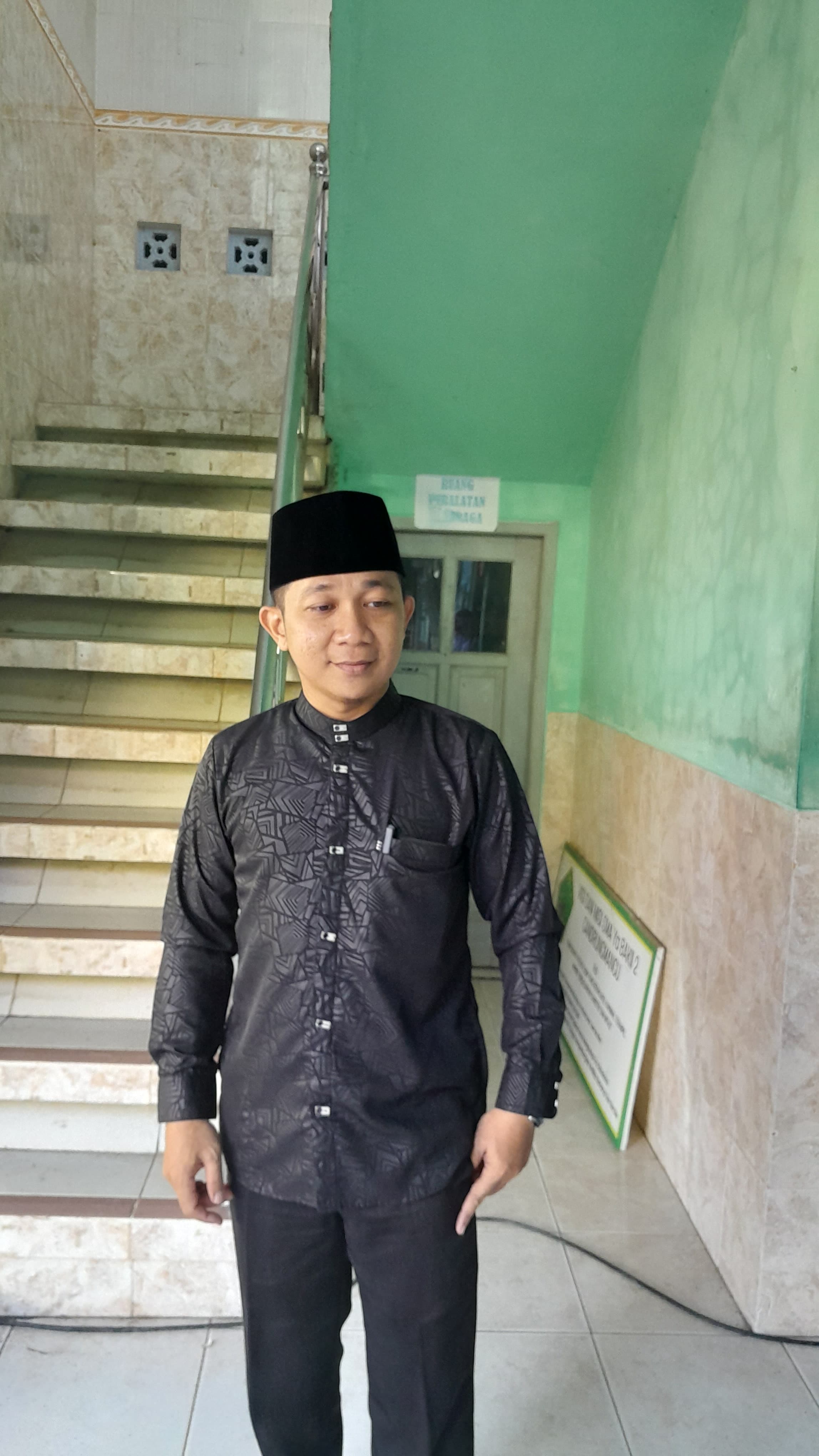 <center>Pembina Marching Band & Madin<br>MOHAMAD NUR SODIQ, S.Pd.I.</center>